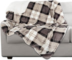 Large dog resting comfortably on the Petmaker water resistant fleece throw in a car seat.