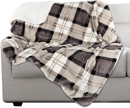 Large dog resting comfortably on the Petmaker water resistant fleece throw in a car seat.