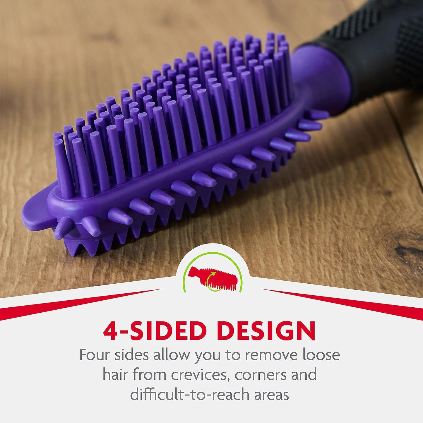 FURminator rubber brush being rinsed under water for easy cleanup.