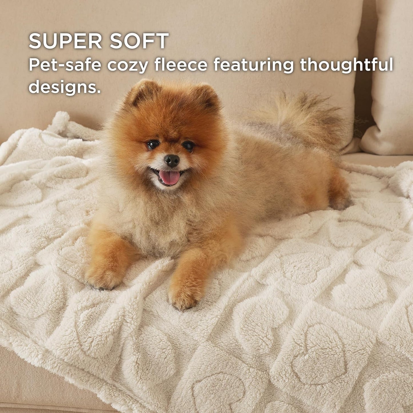 White Bedsure dog blanket spread neatly on a living room couch.