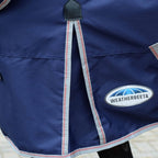 WeatherBeeta ComFiTec Essential horse turnout rug in Western Sunset print showing traditional side gusset layout.