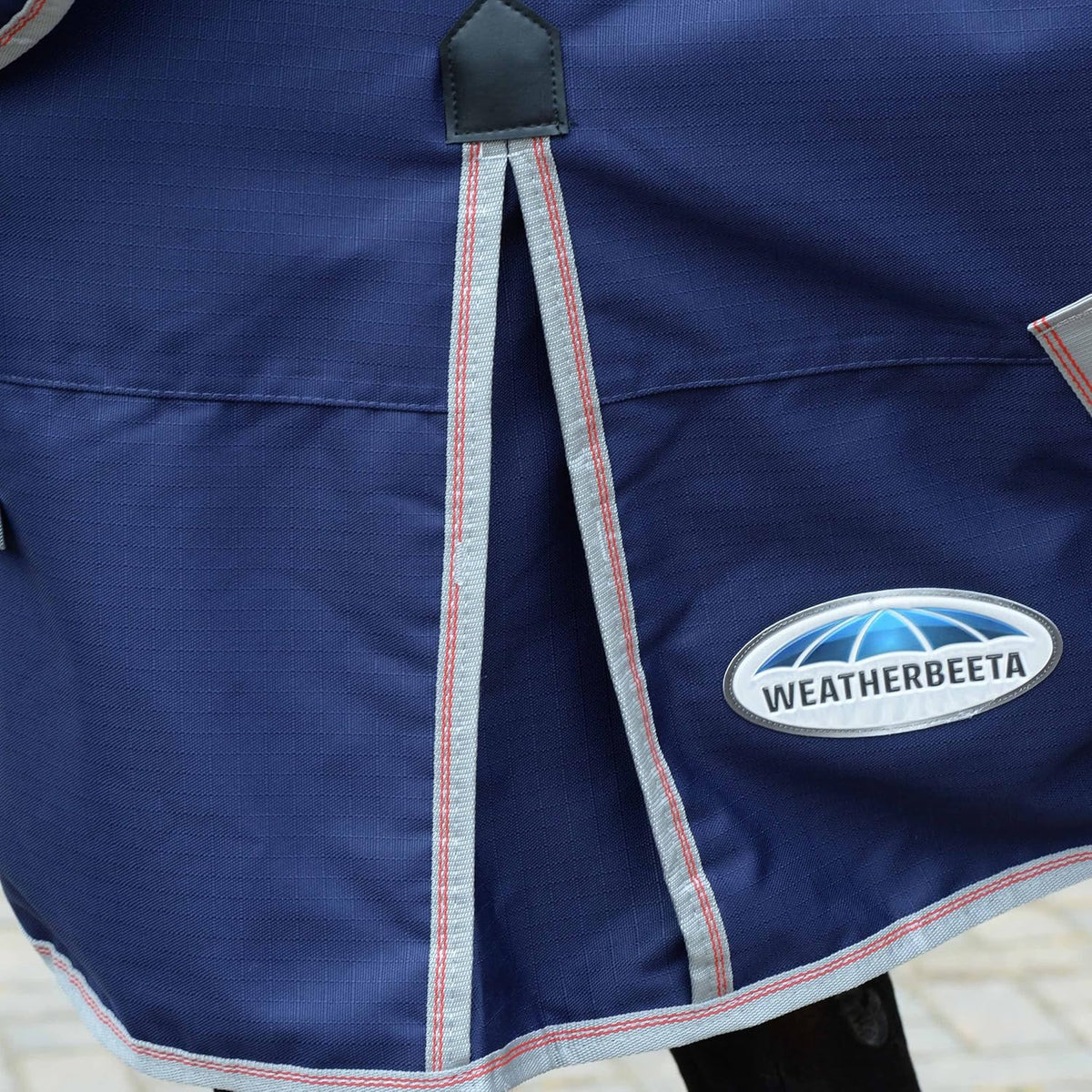 WeatherBeeta ComFiTec Essential horse turnout rug in Western Sunset print showing traditional side gusset layout.