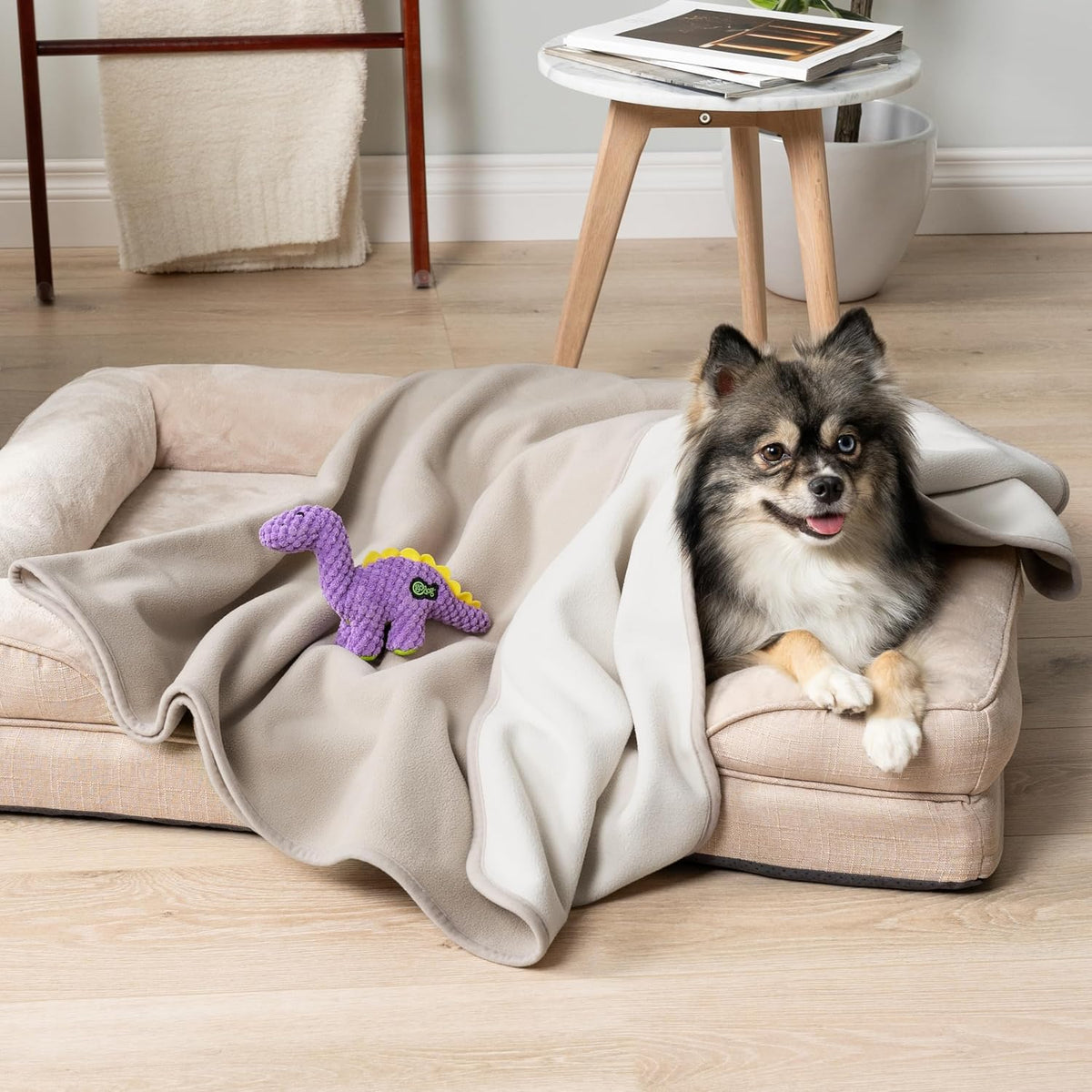 Premium triple layer pee proof pet blanket showing water resistance test.