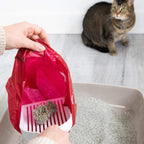 Ubbi heavy duty pet poop disposal sacks with smiling face logo.