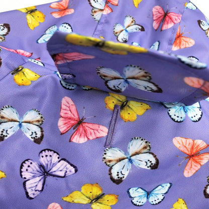 Extra small 10 inch purple pet raincoat with comfortable elastic armholes.