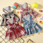 Four piece matching set of plaid puppy dresses with durable nylon leashes.
