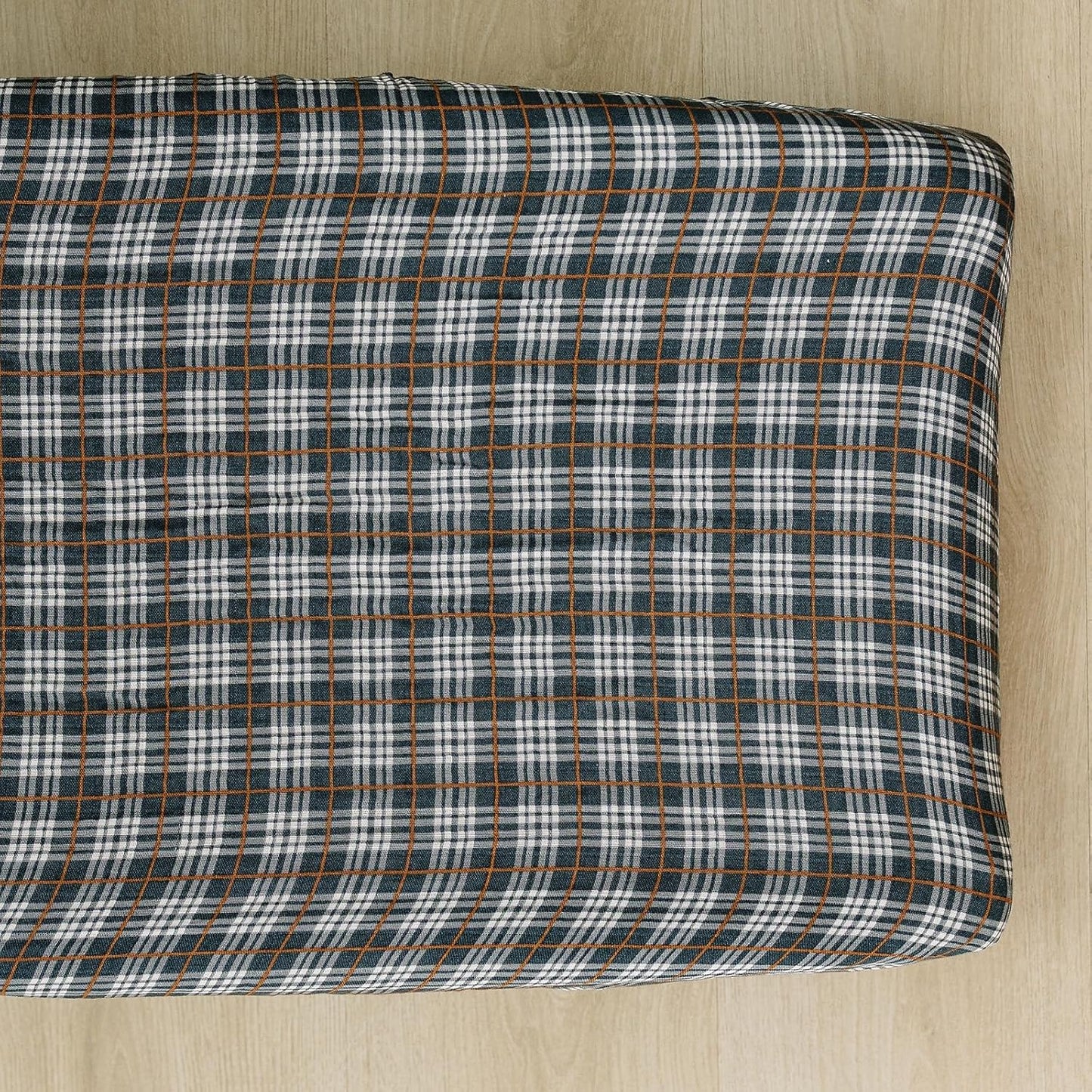Mebie Baby changing pad cover front view in navy plaid pattern