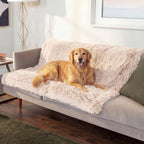 Reversible waterproof calming dog throw blanket on bed