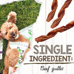 Dog chewing on natural beef jerky stick treat