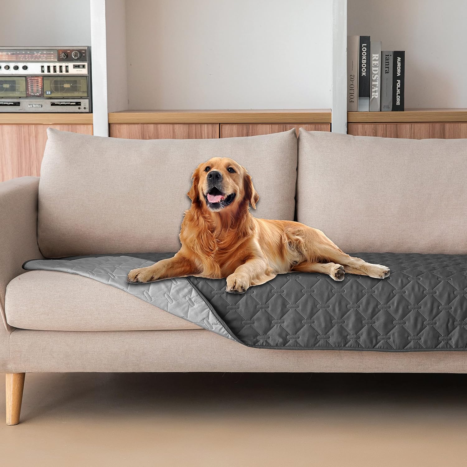 Gogobunny 3X Stronger Waterproof Pet Blanket front view protecting a dark grey couch.