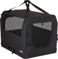 Thule Collapsible Dog Kennel Medium front view showing secure black fabric and mesh door setup.