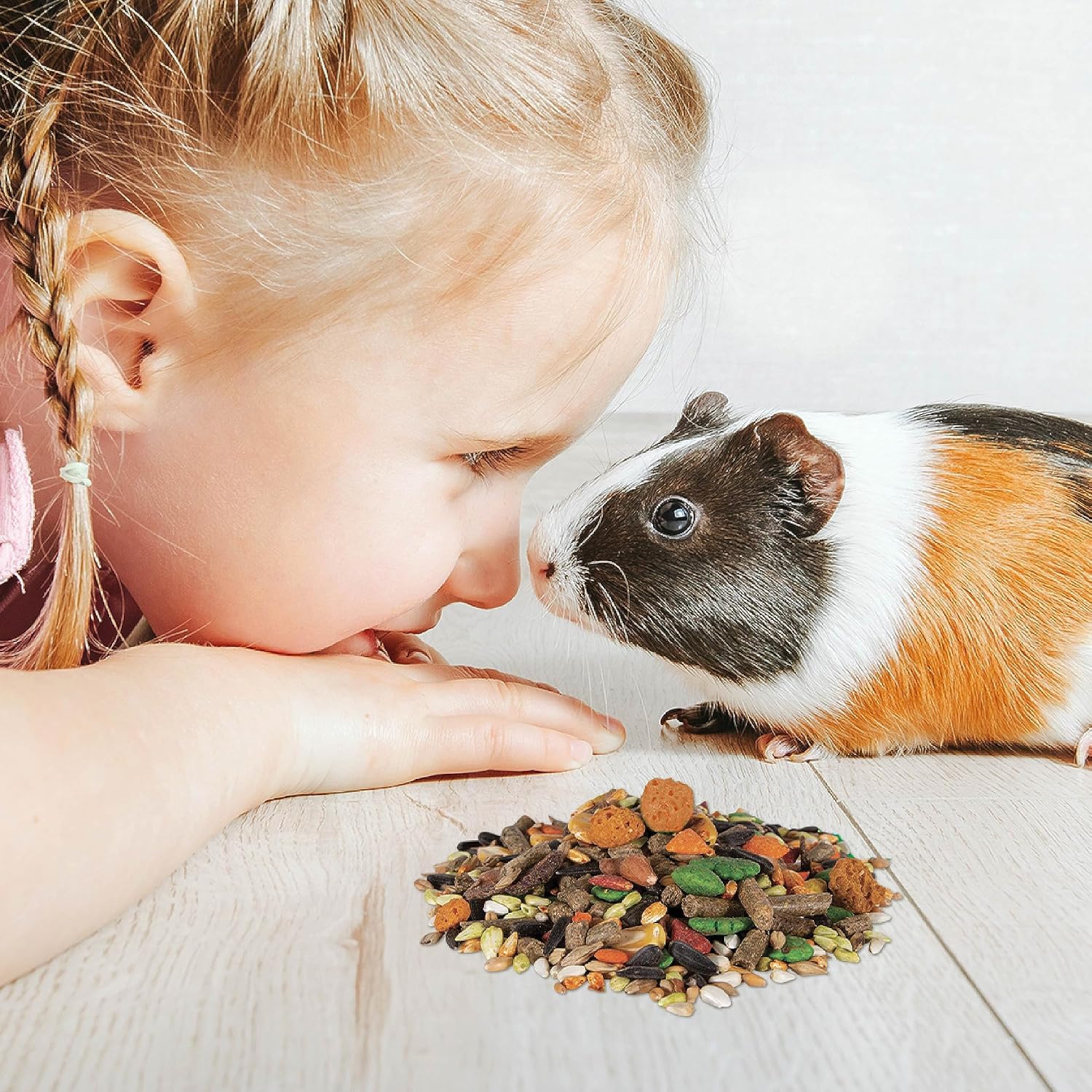 Wholesome grains and real berries blend inside Wild Harvest small pet treat selection.
