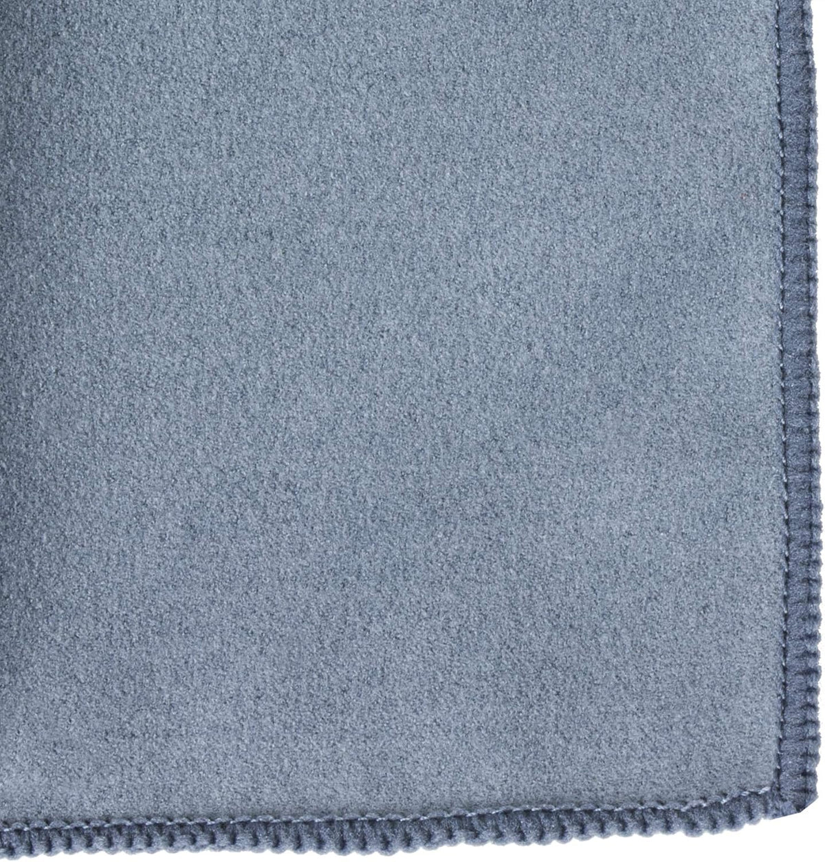 Microfiber towel wiping down a leather horse saddle