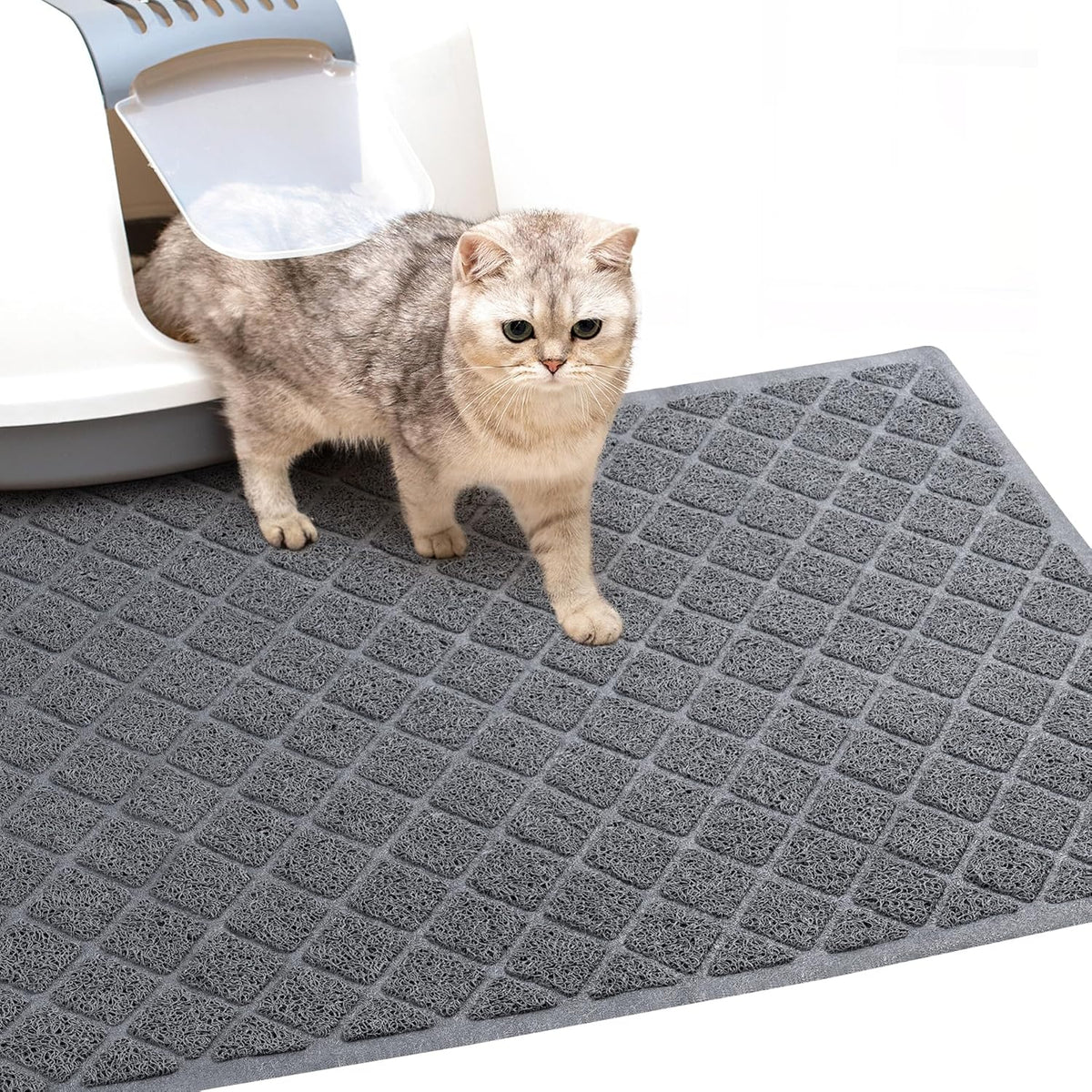 Compact twenty three by fourteen inch grey cat litter trapping pad