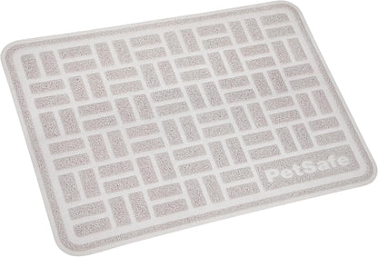 Compact small size PetSafe cat litter mat placed neatly under a litter pan