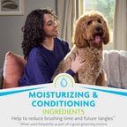 Applying FURminator detangling leave in spray on a curly dog coat