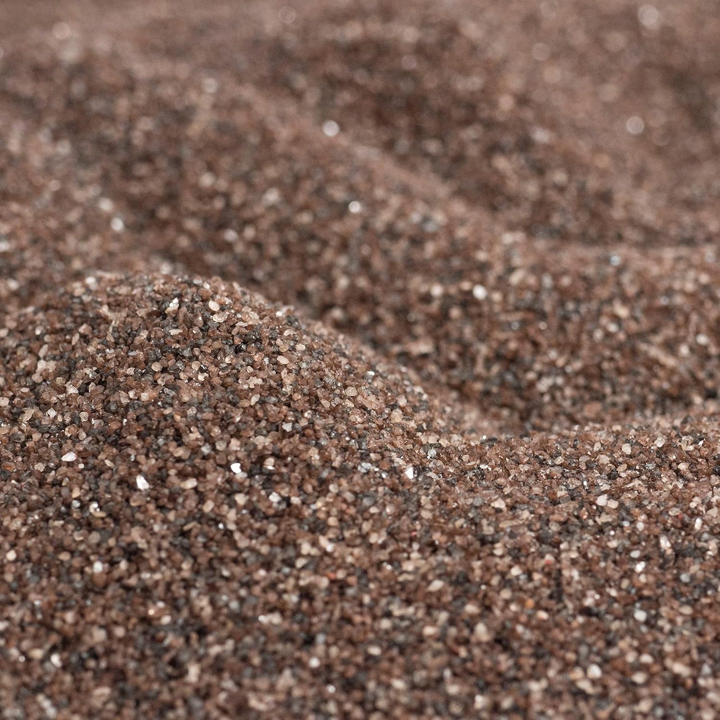 Sandtastik Baltic Brown coarse sand texture close up