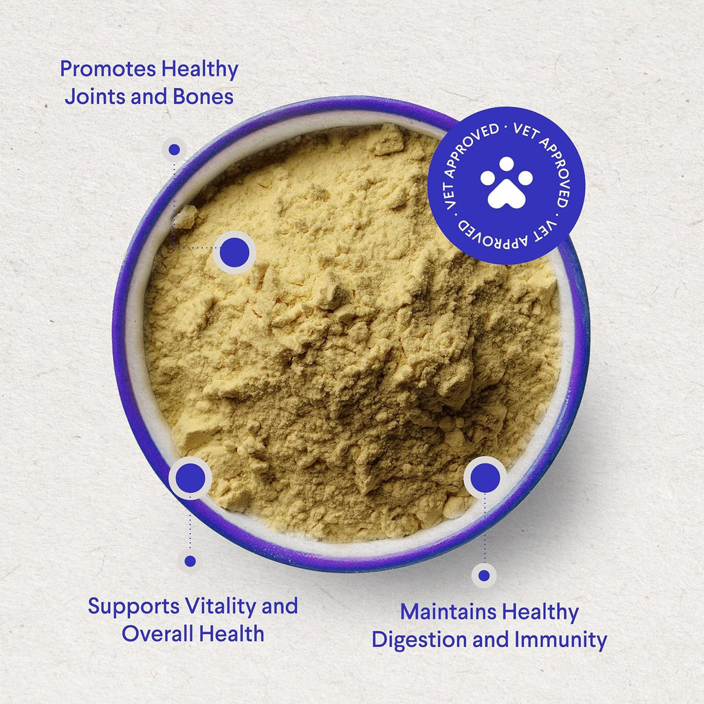 Scooping Wonder Paws beef bone broth powder for pet food topper