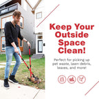 Pawler long handle dog poop rake and tray resting on green yard grass.