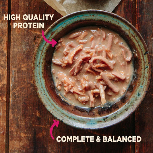Wellness CORE mini dog food pouches in shredded chicken and turkey flavor