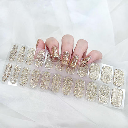 Zoft Ztore semi cured gel nail strips pack front view highlighting premium gold glitter stickers.