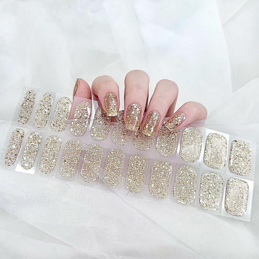 Zoft Ztore semi cured gel nail strips pack front view highlighting premium gold glitter stickers.