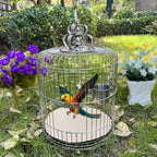 Person cutting gravel paper to fit custom bird cage tray