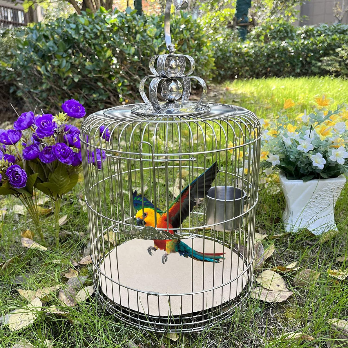 Person cutting gravel paper to fit custom bird cage tray