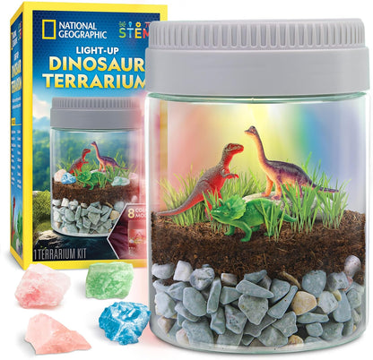 National Geographic Dinosaur Terrarium Kit front view showing illuminated multicolor LED light lid.