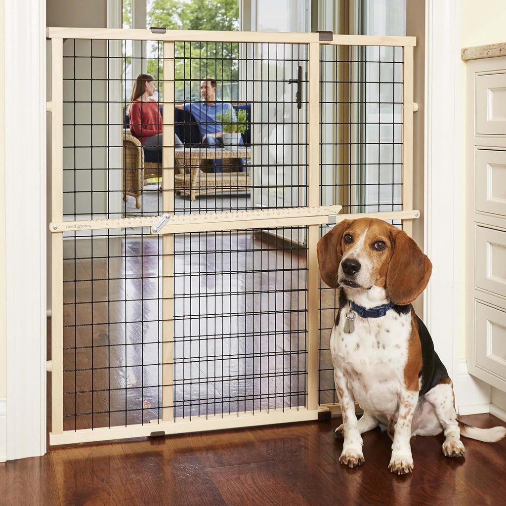 MYPET North States wire mesh dog gate front view installed in a wide doorway