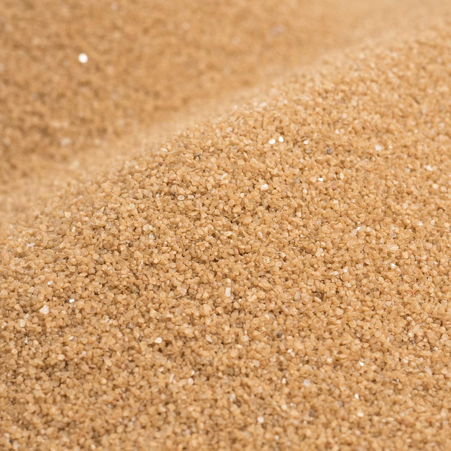 Close up texture of Sandtastik mocha latte coarse sand