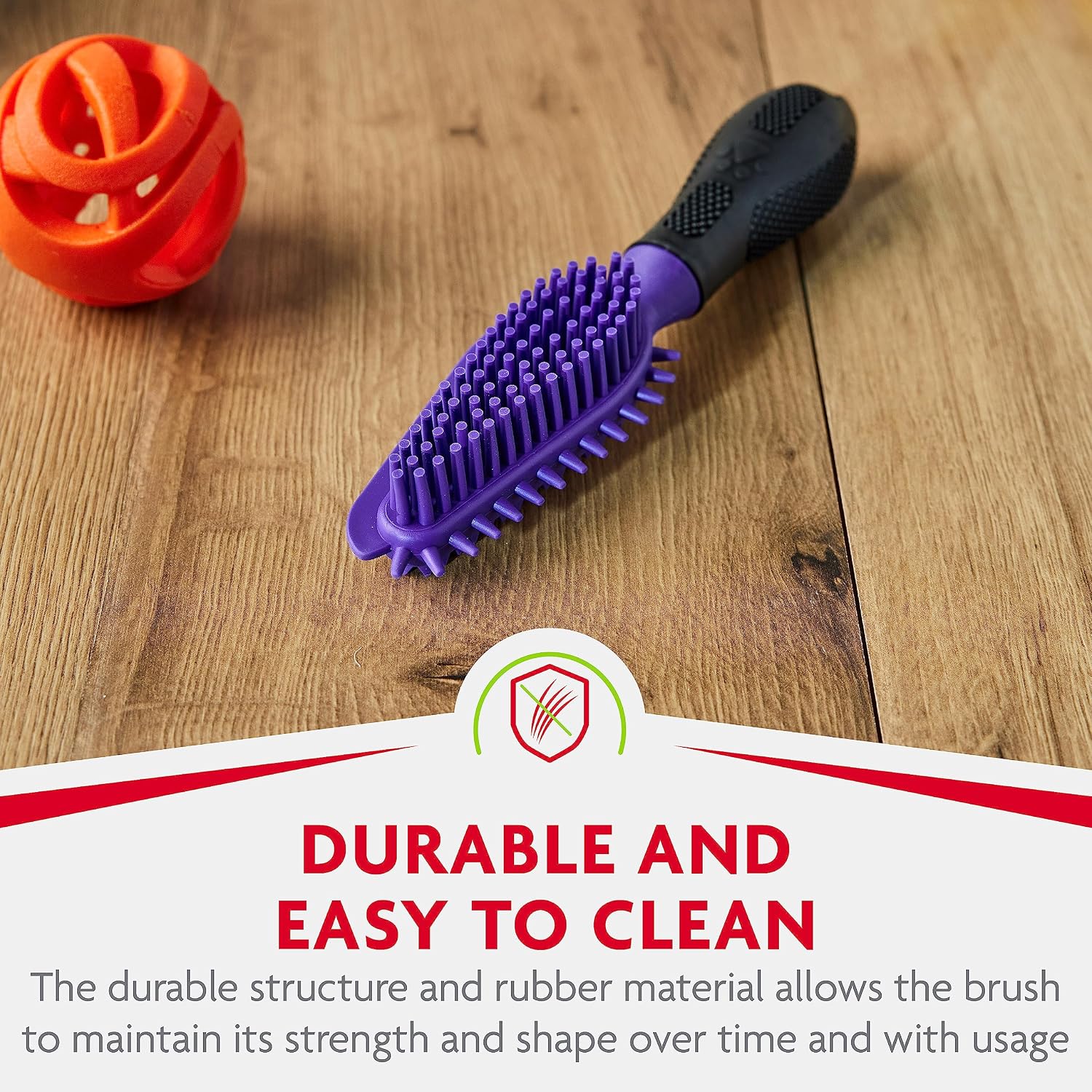 Ergonomic pet hair pickup tool for short and long cat coats.