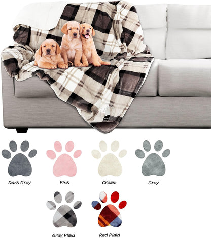Embroidered paw design detail on the Petmaker reversible waterproof pet blanket.