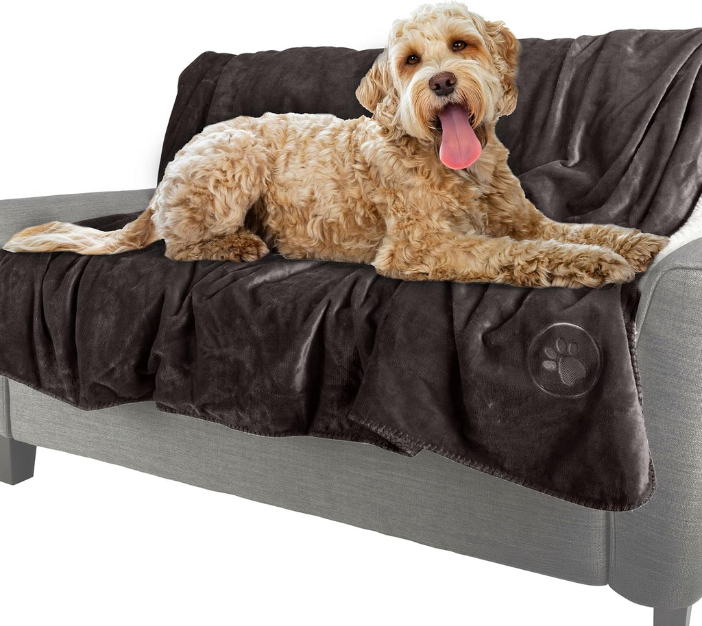 Reversible sherpa fleece pet throw highlighting the plush flannel texture