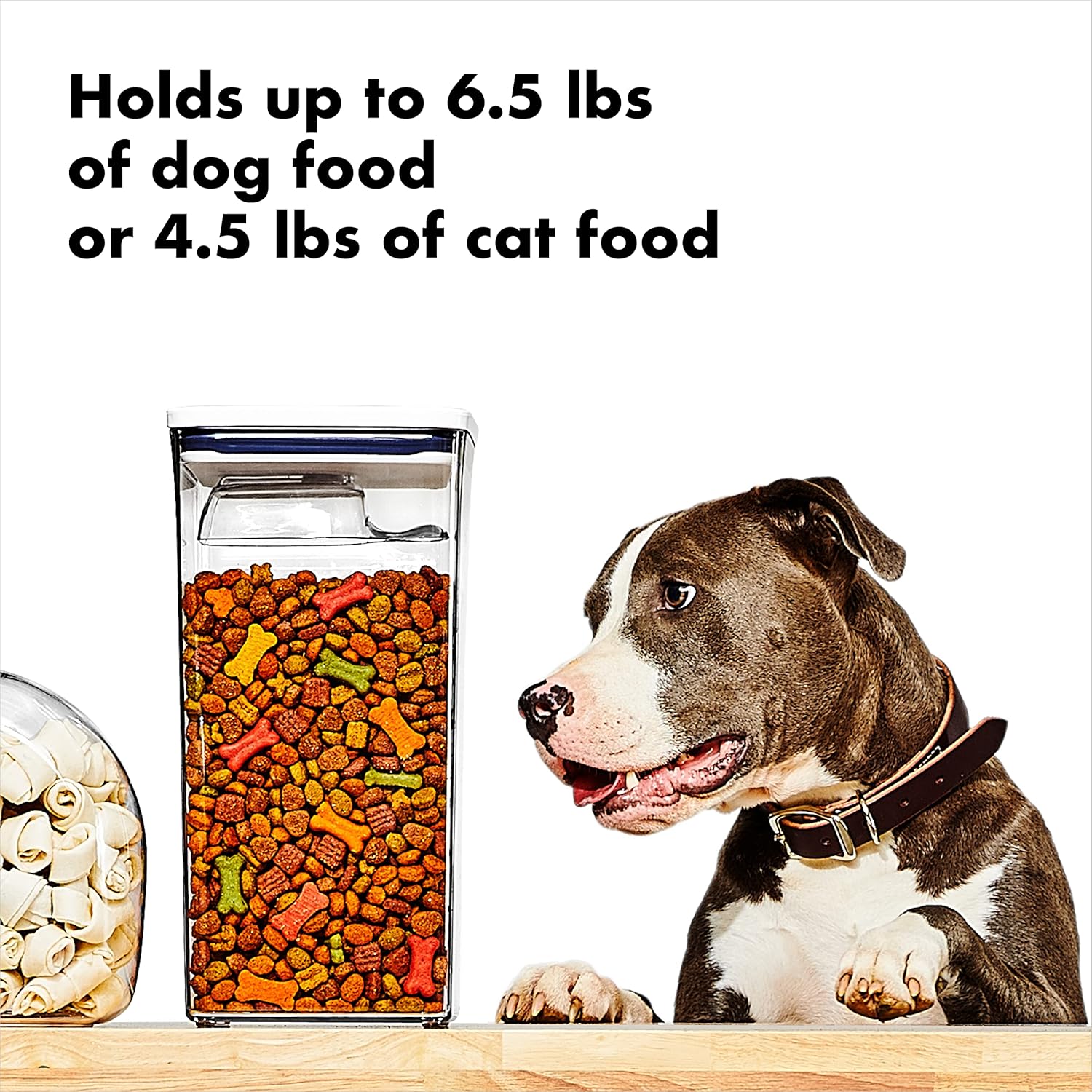 Detachable half cup scoop inside OXO Pet POP container