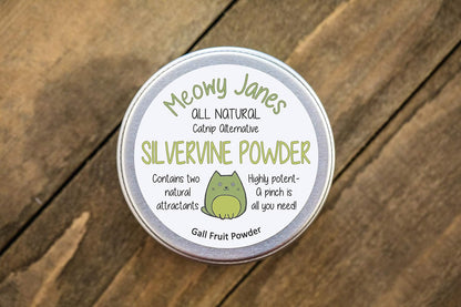 Finely ground silvervine fruit powder being sprinkled on a cat scratching post