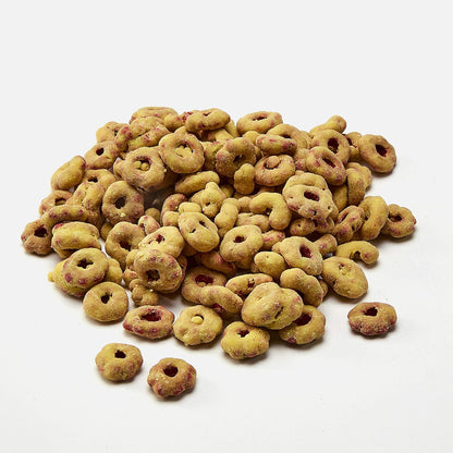 Close up of strawberry banana flavored yogurt bird treats in a bowl