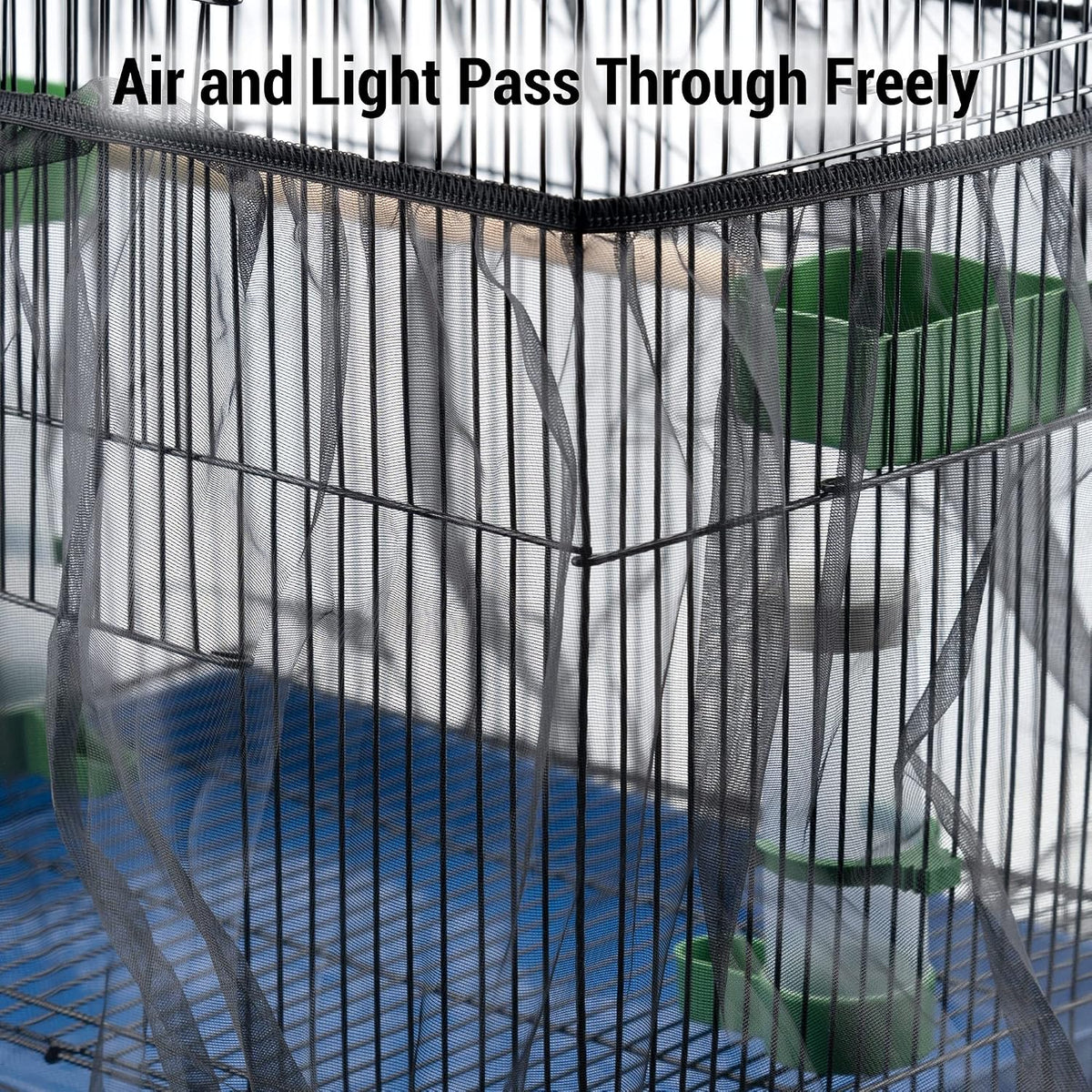 Adjustable bird seed catcher installed on parrot enclosure