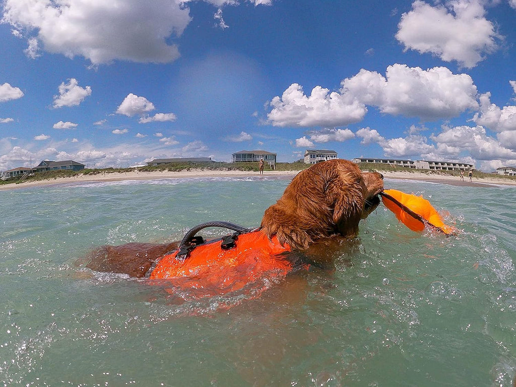 Bark Brite orange medium dog pack showing waterproof zippers on floating side pouches