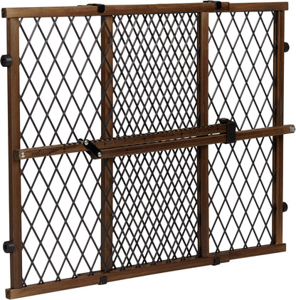 Evenflo Position and Lock Farmhouse Wood Baby Gate front view installed in a modern doorway.