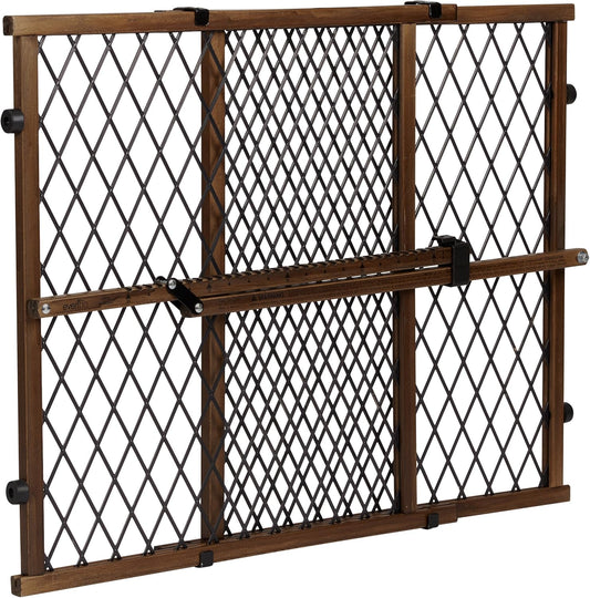 Evenflo Position and Lock Farmhouse Wood Baby Gate front view installed in a modern doorway.