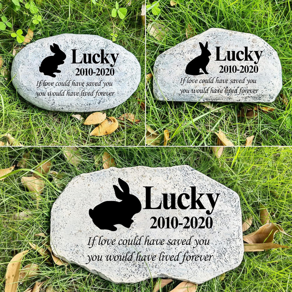 Hand-painted memorial plaque for pets beside a walkway