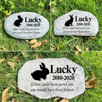 Hand-painted memorial plaque for pets beside a walkway
