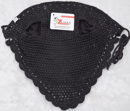 Equestrian horse ear bonnet secured under leather bridle