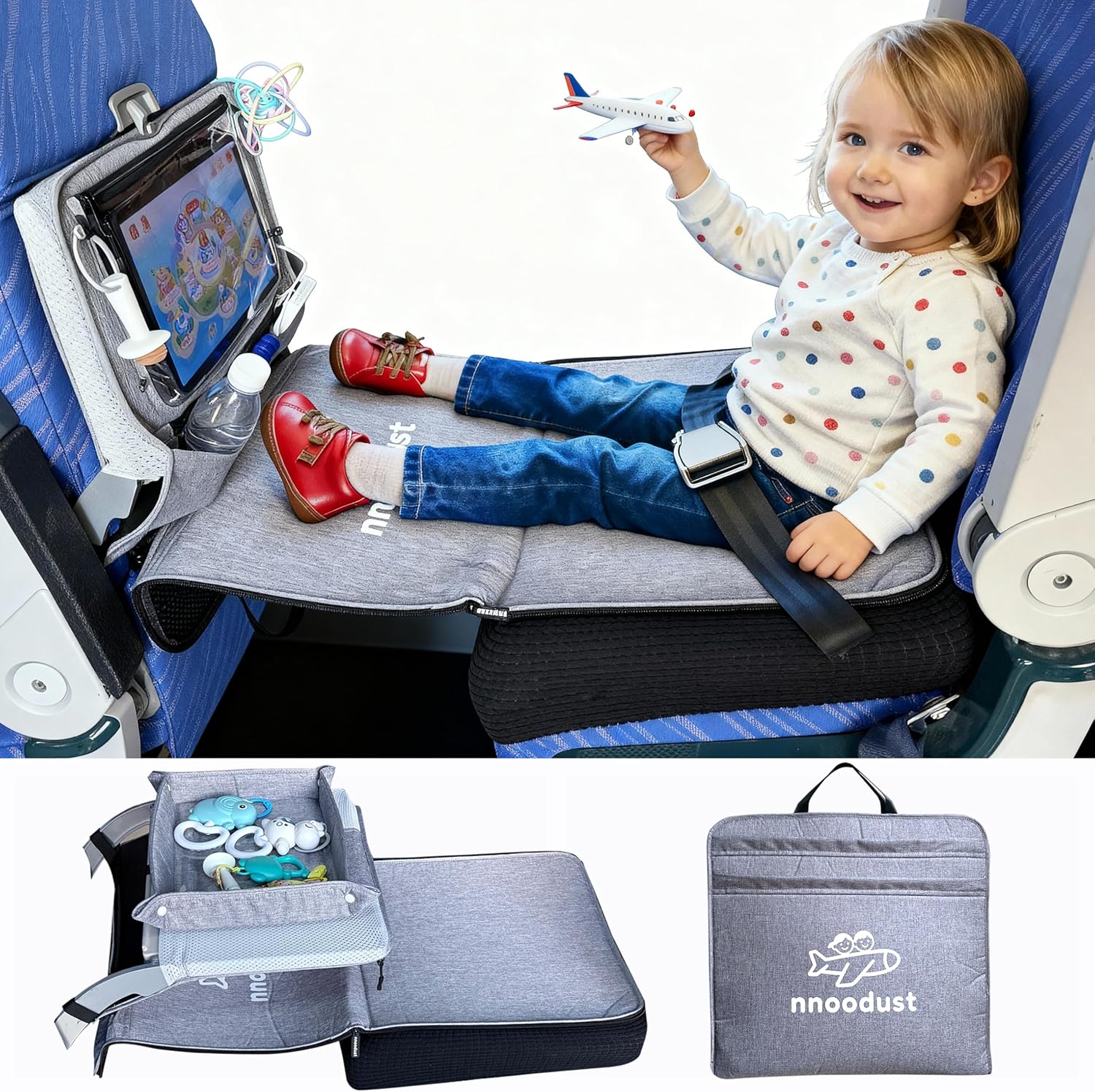 NNOODUST toddler airplane bed front view showing the grey fabric seat extender installed on an economy airplane seat.