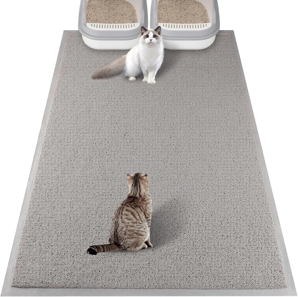 A domestic cat comfortably walking across the protective gray floor mat.