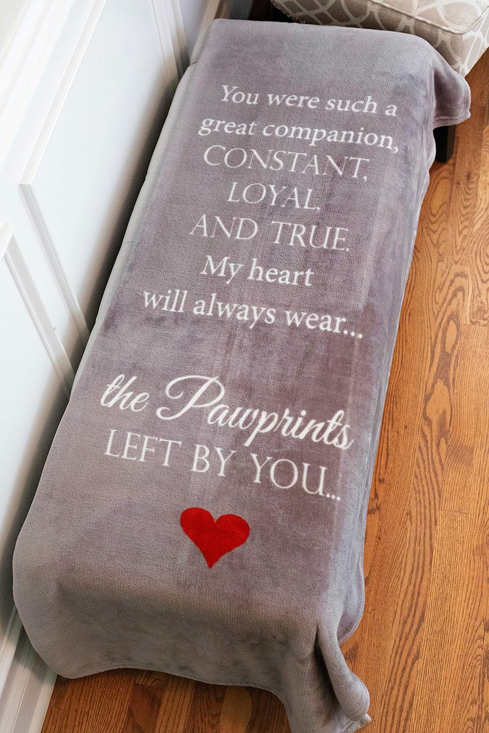 Close-up texture of the 300 GSM heavyweight polyester fleece on the Pawprints Left by You memorial blanket.
