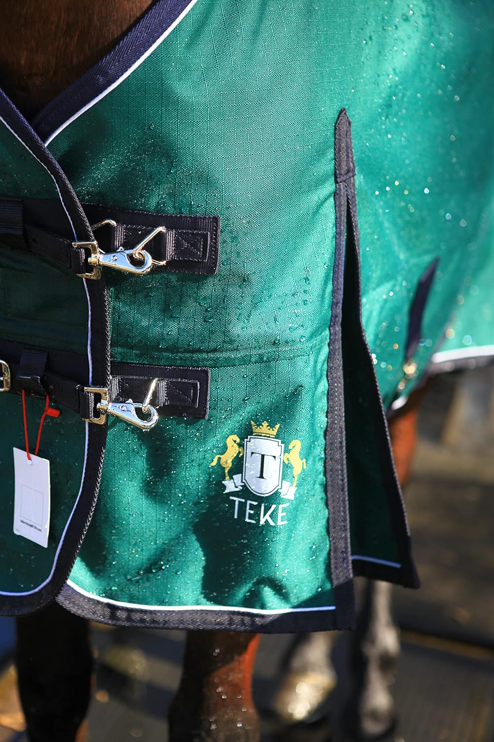 Side view of T TEKE deluxe turnout blanket highlighting deep shoulder gussets.