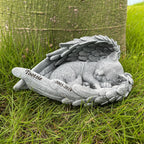Top view detailing the realistic feathered angel wings design of the Youruitom cat statue