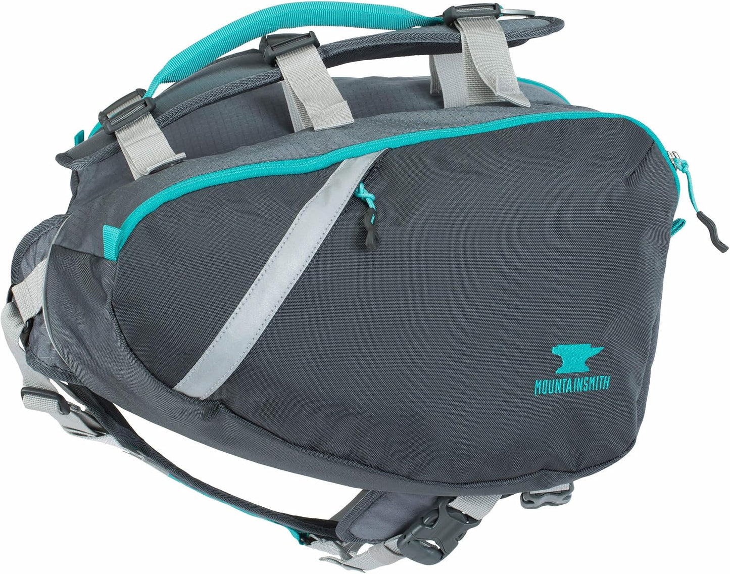 Side view of the Mountainsmith canine backpack showing the water-resistant zipper compartments and reflective trim panels.